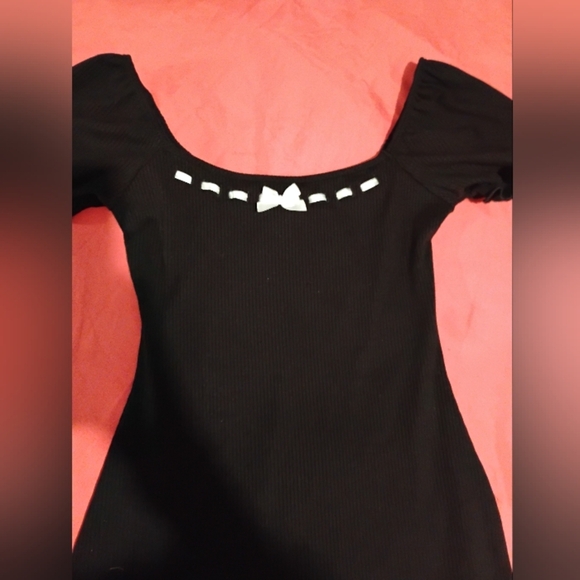 Liz And Sara Elegant Black Mini Dress with White Bow And Stitching Accents. - Picture 11 of 11